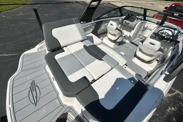 Slide: The Image of 2026 Chaparral 21 SSi boat interior with sleek seating and modern design. - 10