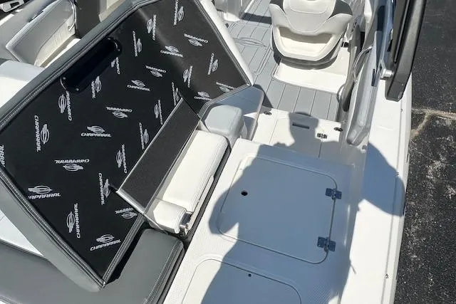 Slide: The Image of 2026 Chaparral 21 SSi boat interior with seating and storage compartments. - 13