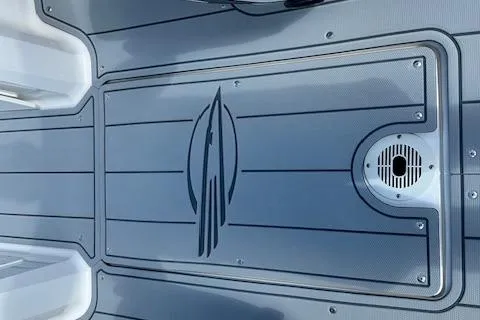 Slide: The Image of 2026 Chaparral 21 SSi boat deck with logo and drainage feature. - 19