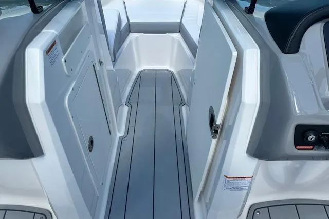 Slide: The Image of 2026 Chaparral 21 SSi boat interior with sleek, modern design and spacious layout. - 20