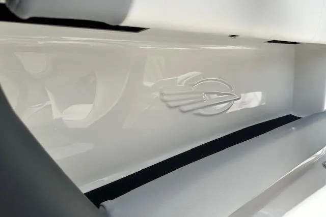 Slide: The Image of 2026 Chaparral 21 SSi boat interior detail with embossed logo and sleek design. - 31