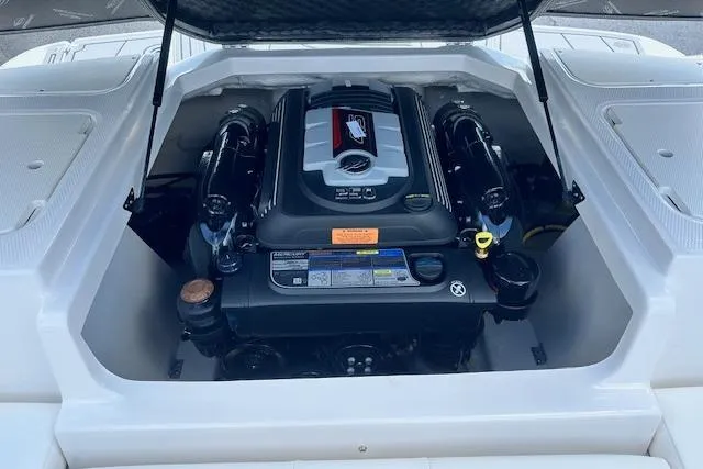 Slide: The Image of Engine compartment of a 2026 Chaparral 21 SSi boat, showcasing a powerful engine. - 33