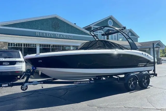 Slide: The Image of 2026 Chaparral 21 SSi boat on trailer at Reed's Marine dealership. - 36