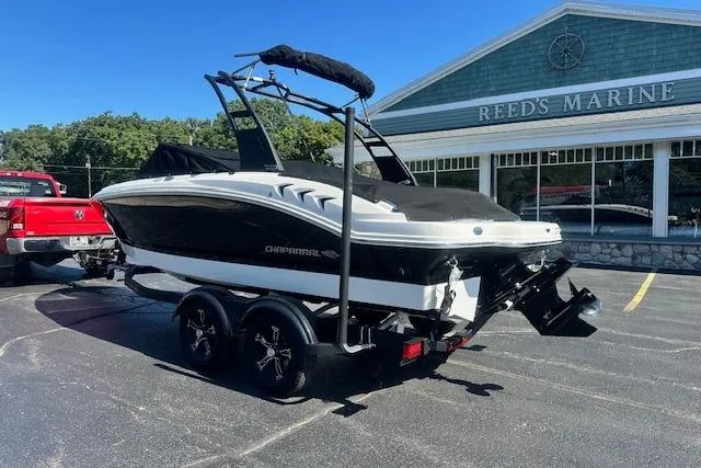 Slide: The Image of 2026 Chaparral 21 SSi boat on trailer outside Reeds Marine dealership. - 37