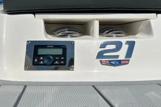 Slide: The Image of 2026 Chaparral 21 SSi boat with audio system and model emblem. - 8