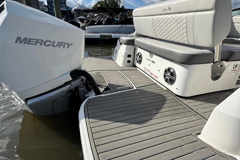 Slide: The Image of 2025 Sea Ray SDX 250 Outboard with Mercury engine, featuring spacious seating and modern design. - 6
