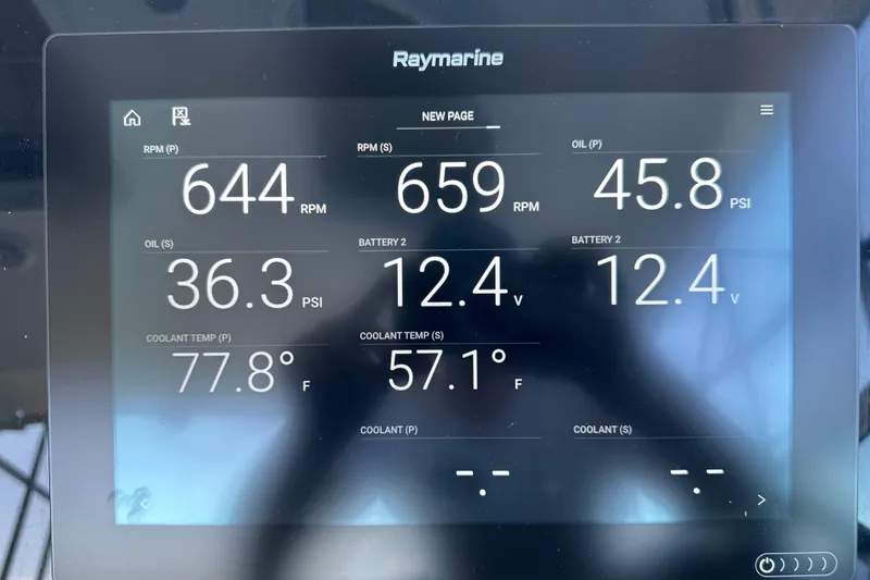 Slide: The Image of 2007 Formula 400 Super Sport boat docked under a covered marina. - 13