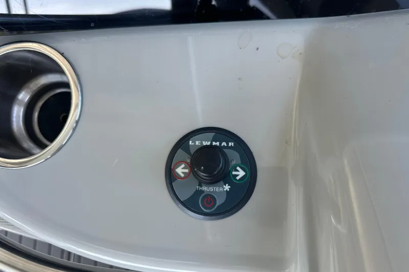 Slide: The Image of 2007 Formula 400 Super Sport boat docked under a covered marina. - 17