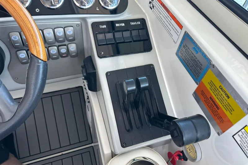 Slide: The Image of Dashboard of a 2007 Formula 400 Super Sport boat with navigation and control displays. - 18