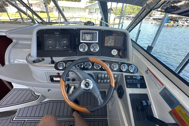 Slide: The Image of Dashboard of a 2007 Formula 400 Super Sport boat with navigation instruments. - 19