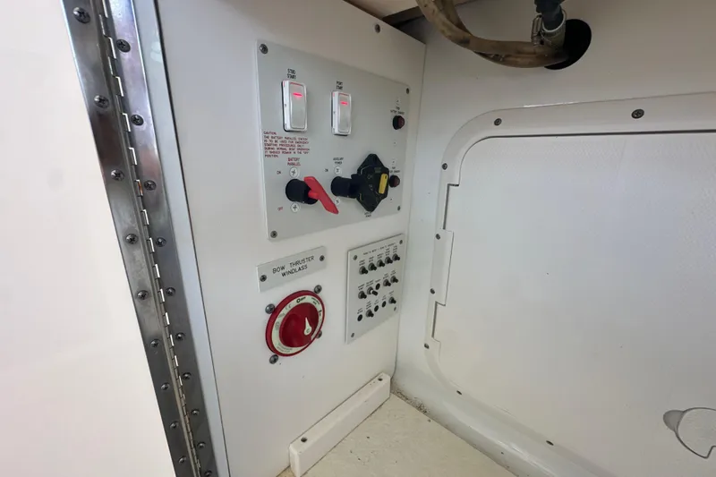 Slide: The Image of Control panel of a 2007 Formula 400 Super Sport boat with steering wheel and throttle levers. - 26