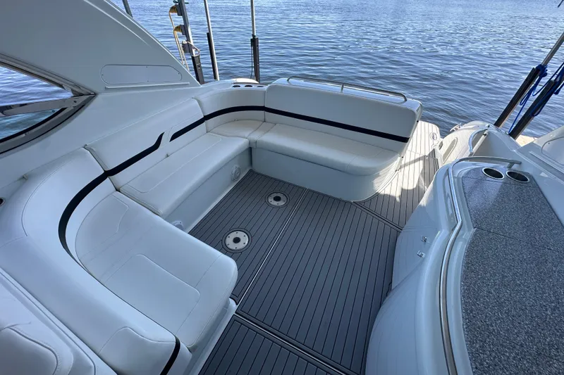 Slide: The Image of 2007 Formula 400 Super Sport boat interior with storage compartment and fire extinguisher. - 35
