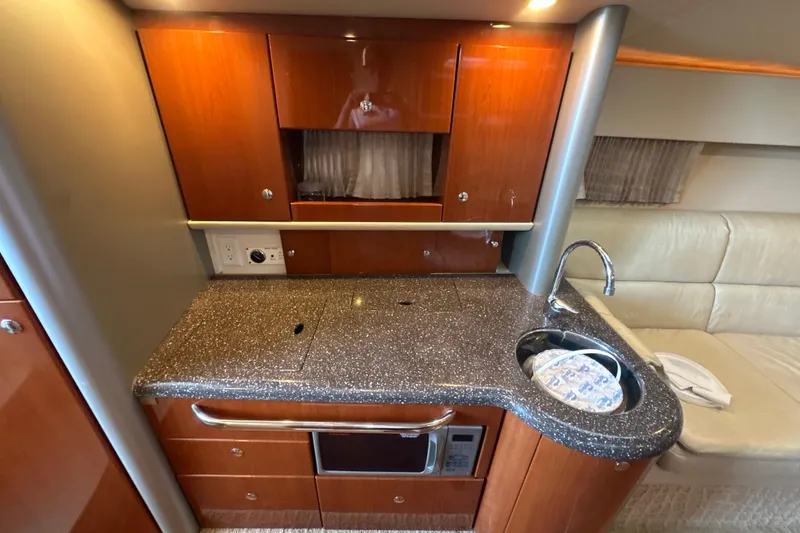 Slide: The Image of 2007 Formula 400 Super Sport yacht with FLIR camera, docked under a canopy. - 41