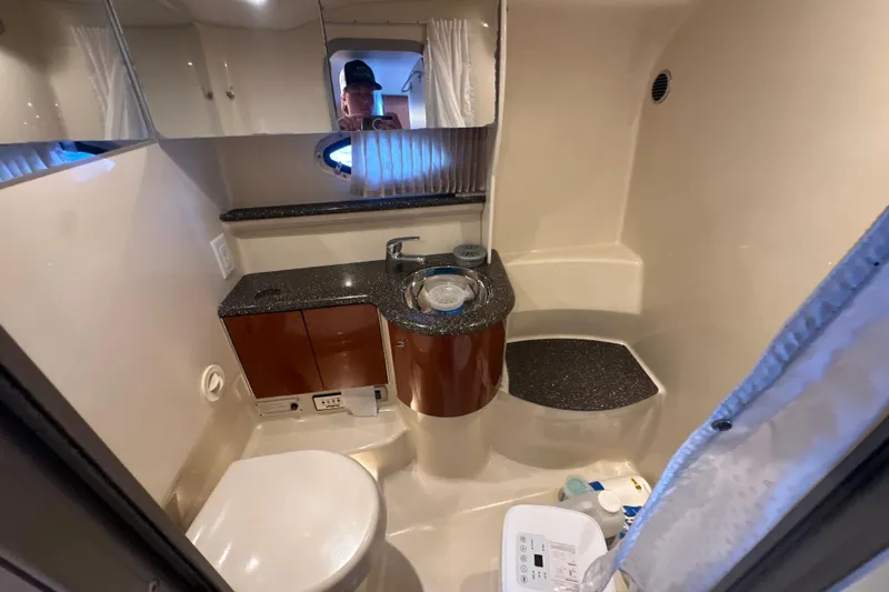 Slide: The Image of Luxurious interior of a 2007 Formula 400 Super Sport yacht with plush seating and TV. - 47