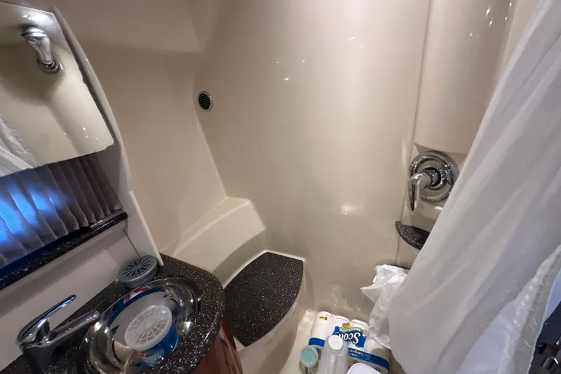 Slide: The Image of 2007 Formula 400 Super Sport yacht interior with kitchenette and seating area. - 49