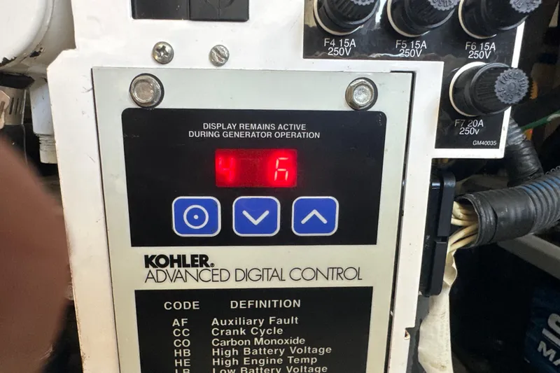 Slide: The Image of Kohler advanced digital control panel displaying error code 46 on a Formula 400 Super Sport. - 63