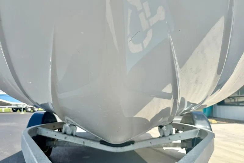 Slide: The Image of 2022 Yamaha Boats SX195 hull on trailer, close-up view. - 10