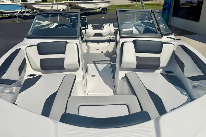 Slide: The Image of 2022 Yamaha Boats SX195 interior with sleek seating and modern design. - 11
