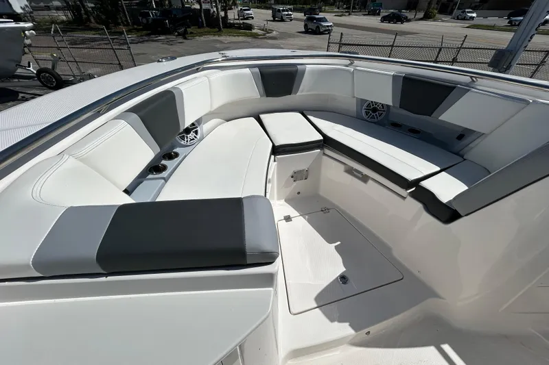 Slide: The Image of 2026 Robalo R360 Center Console boat interior with spacious seating and modern design. - 11