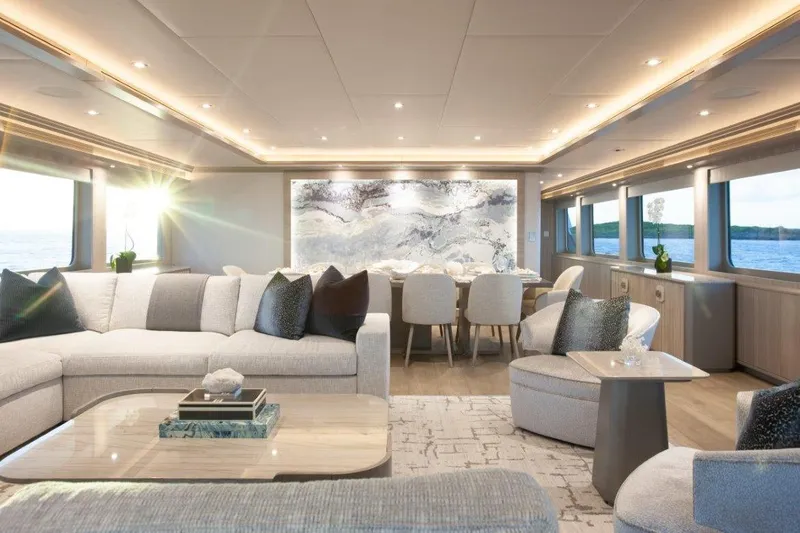 Slide: The Image of Luxurious interior of 2000 Trinity Yachts Trinity 160 with elegant seating and dining area. - 16