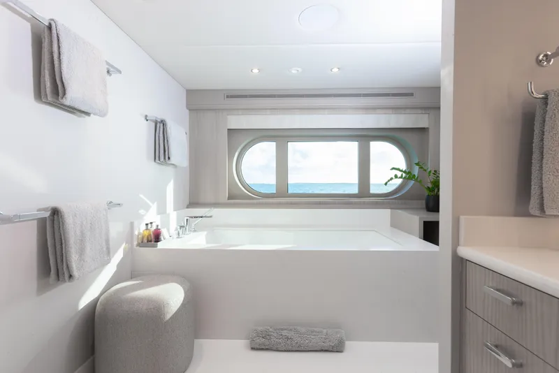 Slide: The Image of Luxurious yacht bathroom with ocean view, featuring modern design and elegant fixtures. - 22