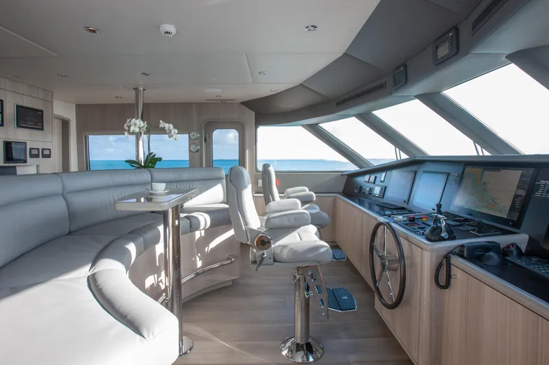 Slide: The Image of Luxurious interior of 2000 Trinity Yachts Trinity 160, featuring modern helm and seating area. - 26