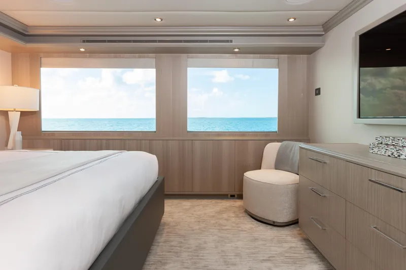 Slide: The Image of Luxurious bedroom interior on 2000 Trinity Yachts Trinity 160, featuring ocean view windows. - 28