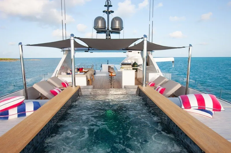 Slide: The Image of Luxurious Trinity 160 yacht deck with pool, sun loungers, and ocean view, 2000 model. - 48