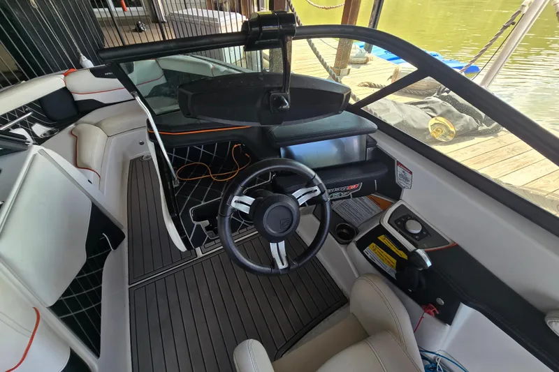 Slide: The Image of Dashboard display of a 2018 Natique GS20 boat showing speed and system controls. - 17