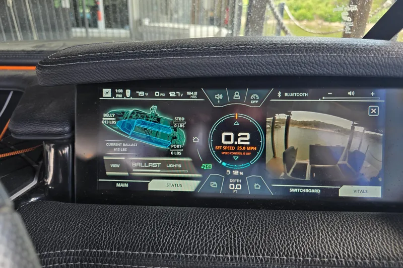 Slide: The Image of 2018 Nautique GS20 engine compartment with PCM engine and red components. - 19