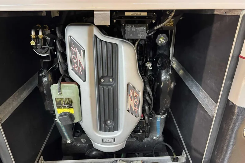 Slide: The Image of 2009 Nautique Super Air Nautique 210 Byerly engine compartment with ZR 409 engine. - 16