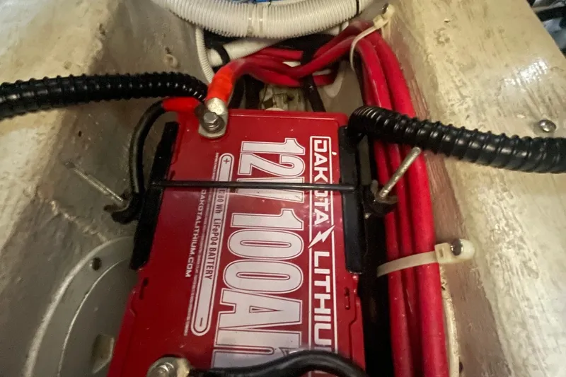 Slide: The Image of Dakota Lithium battery in 2002 Carver 346 Aft Cabin boat, 12V 100Ah capacity. - 28