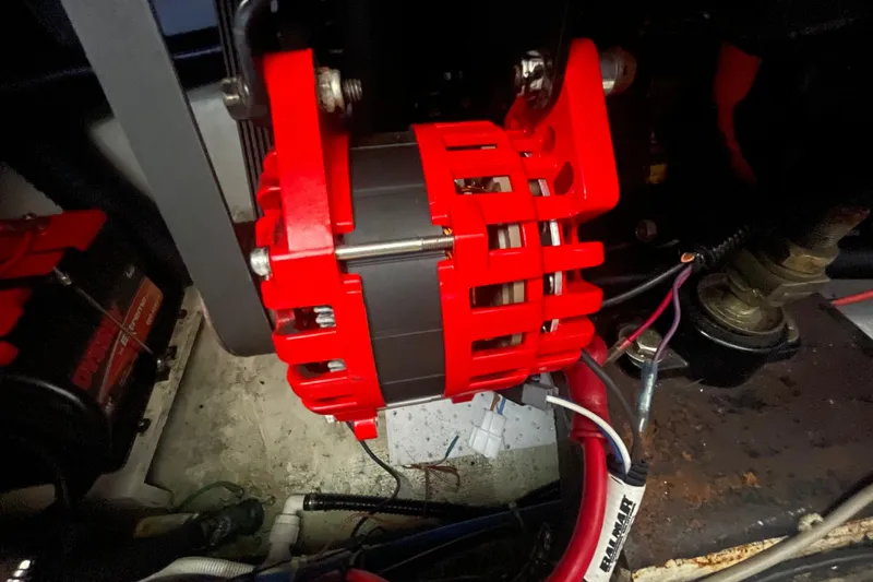 Slide: The Image of Red alternator in a 2002 Carver 346 Aft Cabin engine compartment. - 32