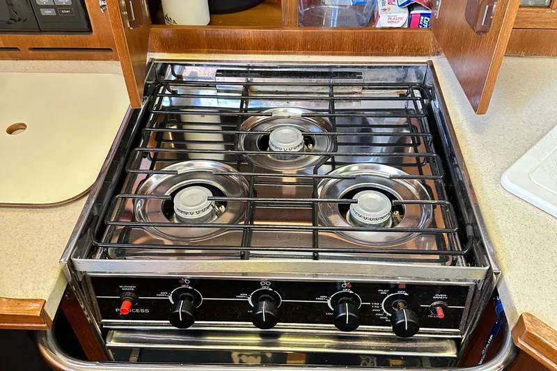 Slide: The Image of Four-burner stove in 2006 Hunter 41 Deck Salon yacht kitchen. - 32