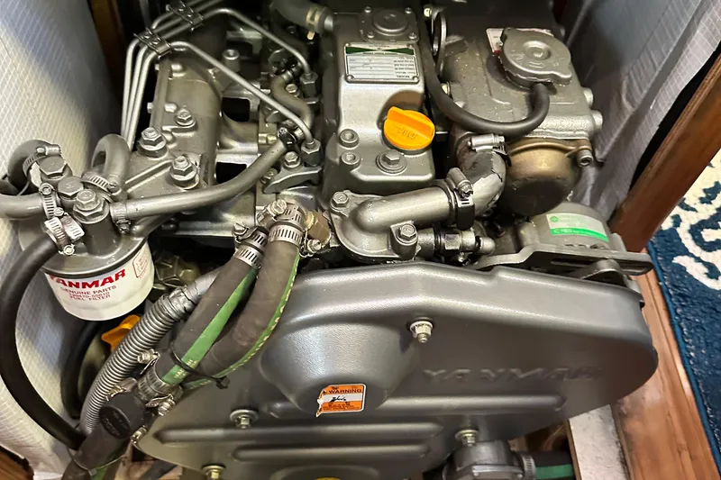 Slide: The Image of Engine of a 2006 Hunter 41 Deck Salon sailboat, featuring Yanmar components. - 66