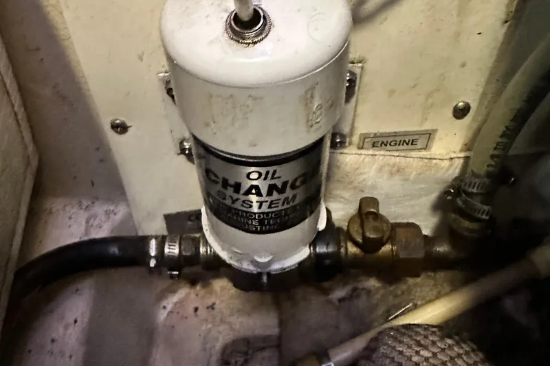 Slide: The Image of Oil change system in 2006 Hunter 41 Deck Salon engine compartment. - 67