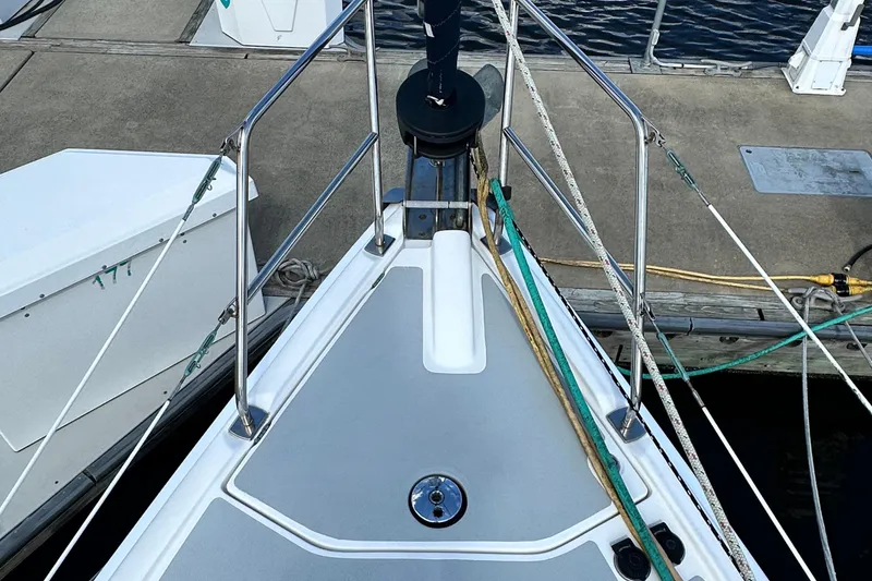 Slide: The Image of Bow view of 2006 Hunter 41 Deck Salon sailboat docked at marina. - 8