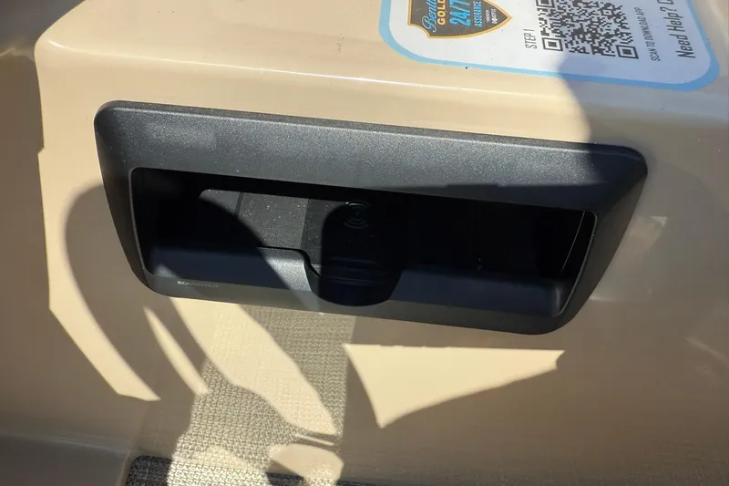 Slide: The Image of 2025 Bentley Pontoons Legacy 243 Navigator dashboard with QR code and storage compartment. - 15