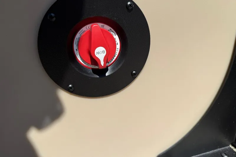 Slide: The Image of Close-up of a red control knob on a 2025 Bentley Pontoons Legacy 243 Navigator. - 7