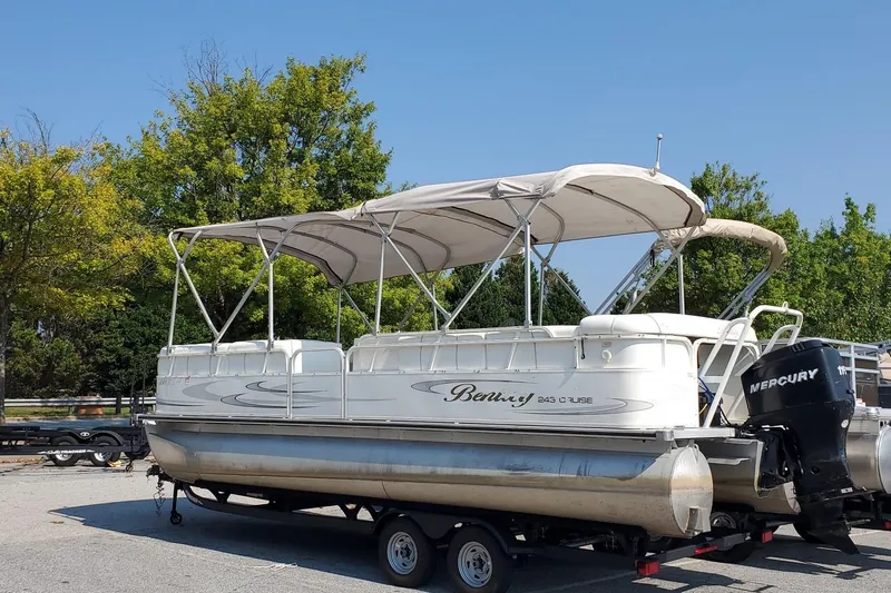 Slide: The Image of 2006 Bentley Pontoons 243 Cruise on trailer, featuring Mercury outboard motor. - 7