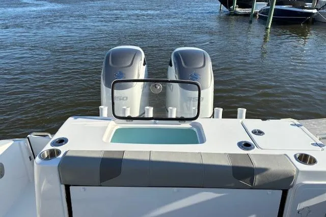 Slide: The Image of 2024 Cape Horn 34 XS boat with dual engines and sleek design on the water. - 4