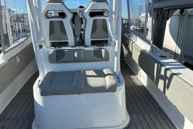 Slide: The Image of 2024 Cape Horn 34 XS boat interior with modern seating and sleek design. - 15