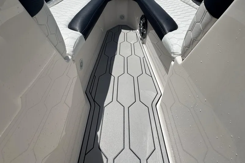 Slide: The Image of Interior view of 2008 Regal 2520 FasDeck boat with stylish seating and flooring. - 14