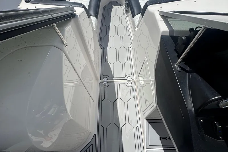 Slide: The Image of 2008 Regal 2520 FasDeck boat interior with sleek, modern flooring design. - 20