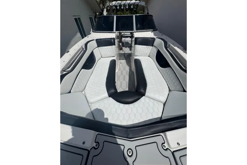 Slide: The Image of 2008 Regal 2520 FasDeck boat interior with hexagonal-patterned seating and sleek design. - 22