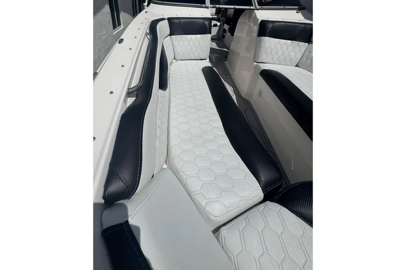 Slide: The Image of Luxurious seating on 2008 Regal 2520 FasDeck boat with hexagonal pattern upholstery. - 24