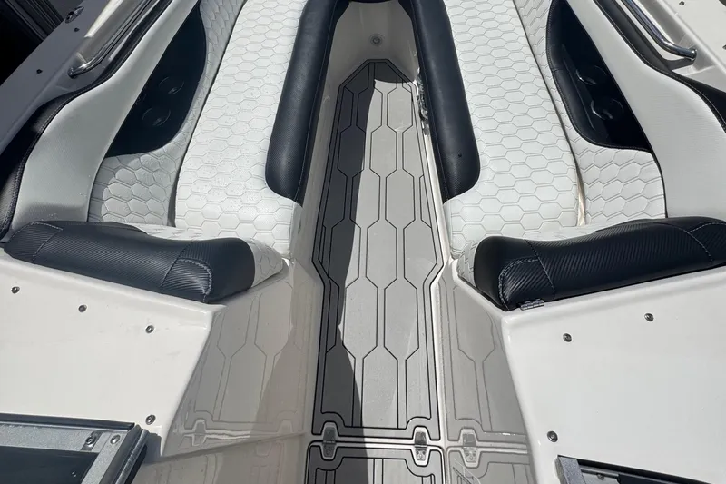 Slide: The Image of Interior of 2008 Regal 2520 FasDeck boat with hexagonal-patterned seating. - 28