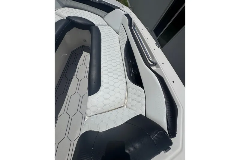 Slide: The Image of 2008 Regal 2520 FasDeck boat interior with hexagonal-patterned seating and sleek design. - 30