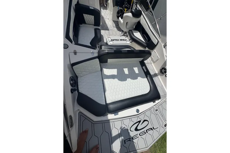 Slide: The Image of 2008 Regal 2520 FasDeck boat interior with stylish seating and logo. - 34