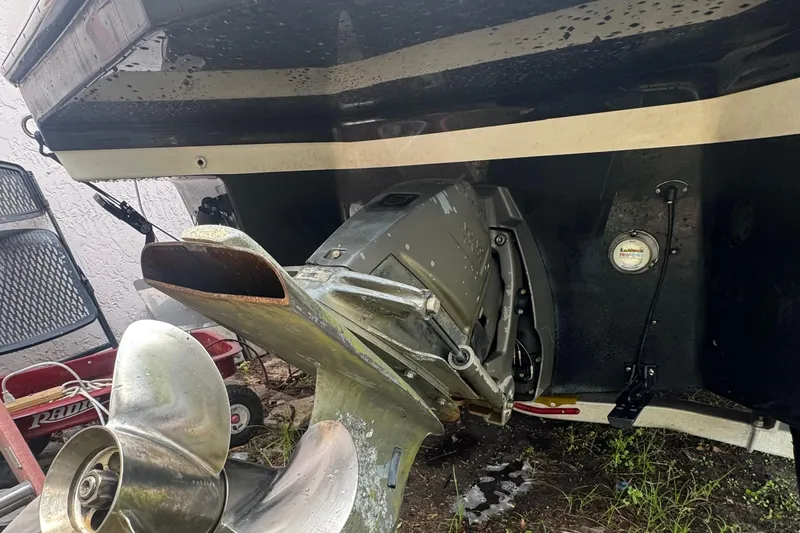 Slide: The Image of Rear view of a 2008 Regal 2520 FasDeck boat showing the propeller and stern drive. - 39